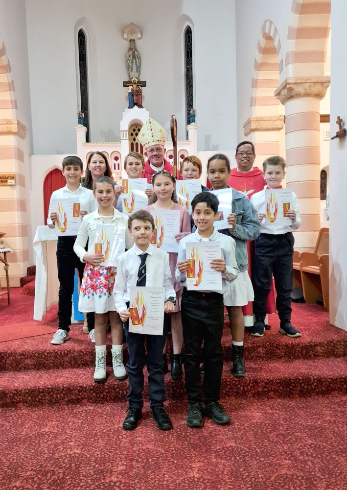 Bishop Michael Morrissey and Fr Larry Rodillas with St Mary's Confirmation Class